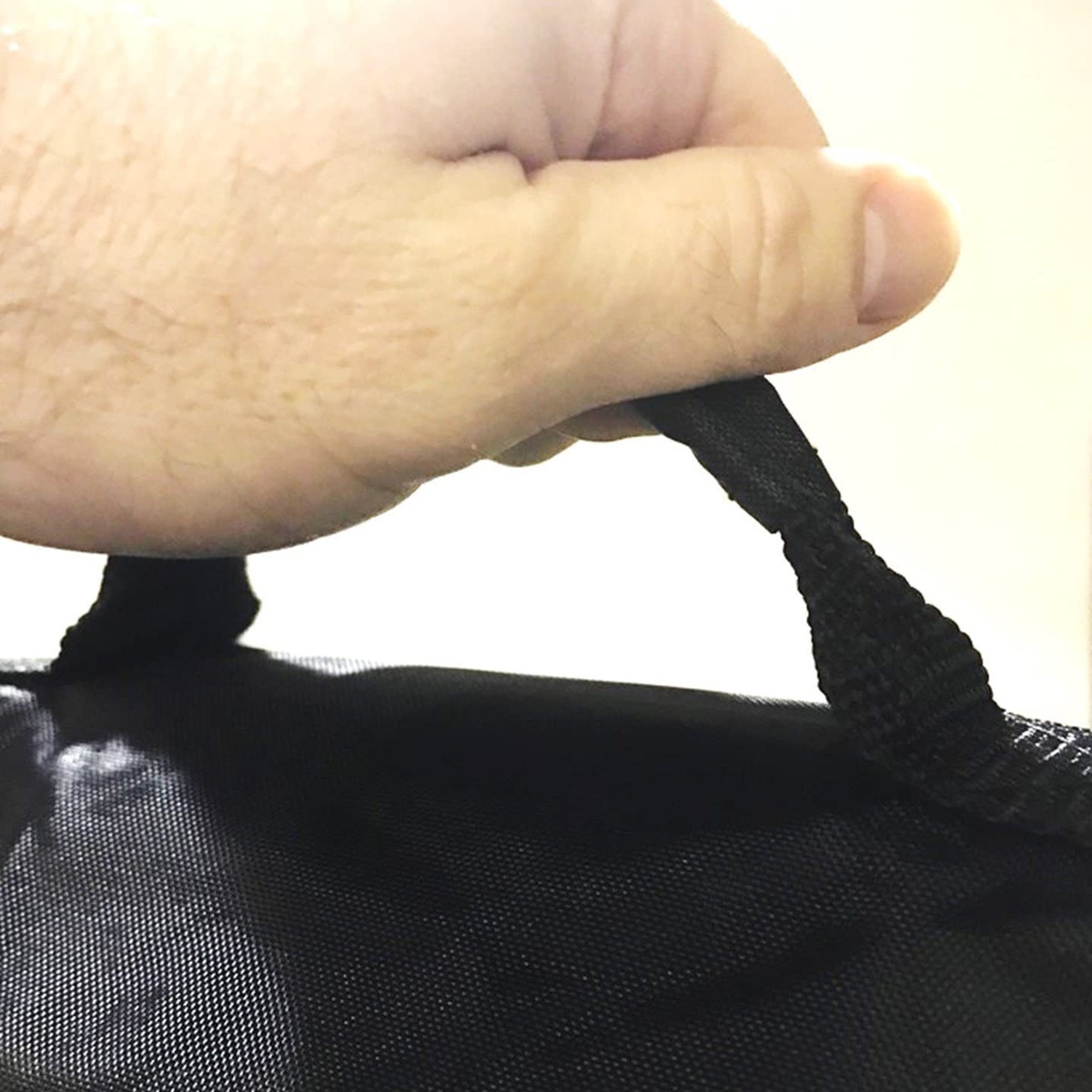 Nylon handle to hang table cover during play